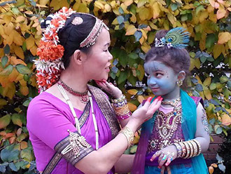 Little Krishna and dancer in pose
